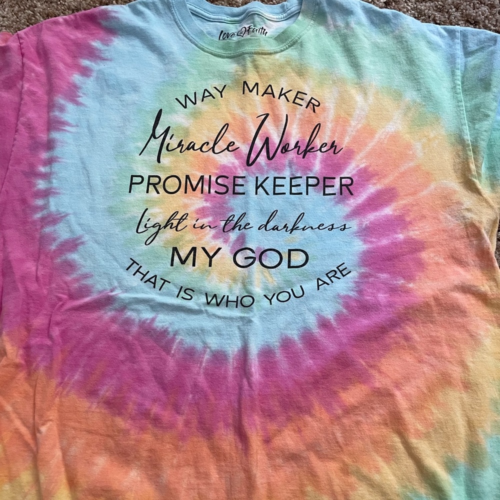 Rainbow tie dye shirt with a Christian saying on it in a size XL